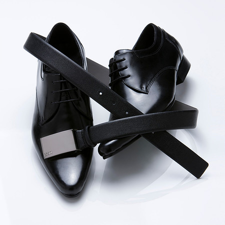 mens still life fashion photography showcasing accessories such as shoes and belt